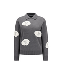 A dark gray knit polo sweater featuring four white cloud-shaped appliqués with embroidered geometric patterns, displayed on a solid white background.